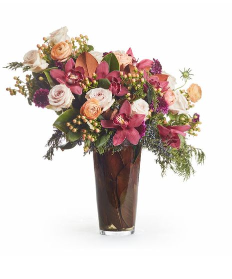 Burgundy Orchids, Blush Roses with Winter Greens