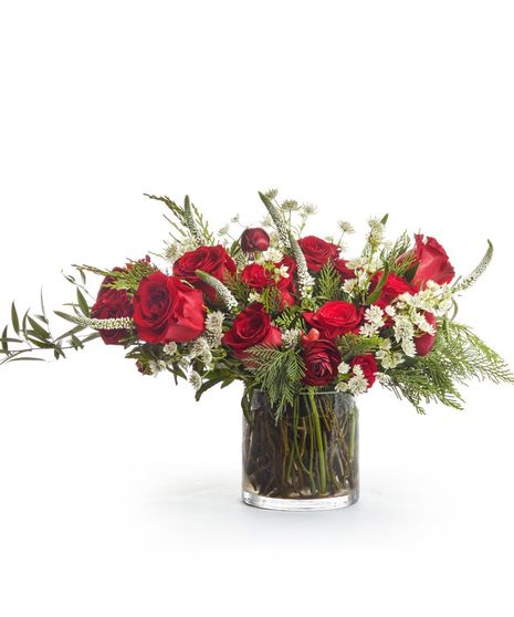 Red Roses + Winter Greens in Glass Vase