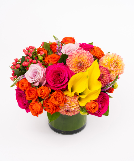 Coral Dahlia + Hot Pink Roses in Leaf Lined Cylinder